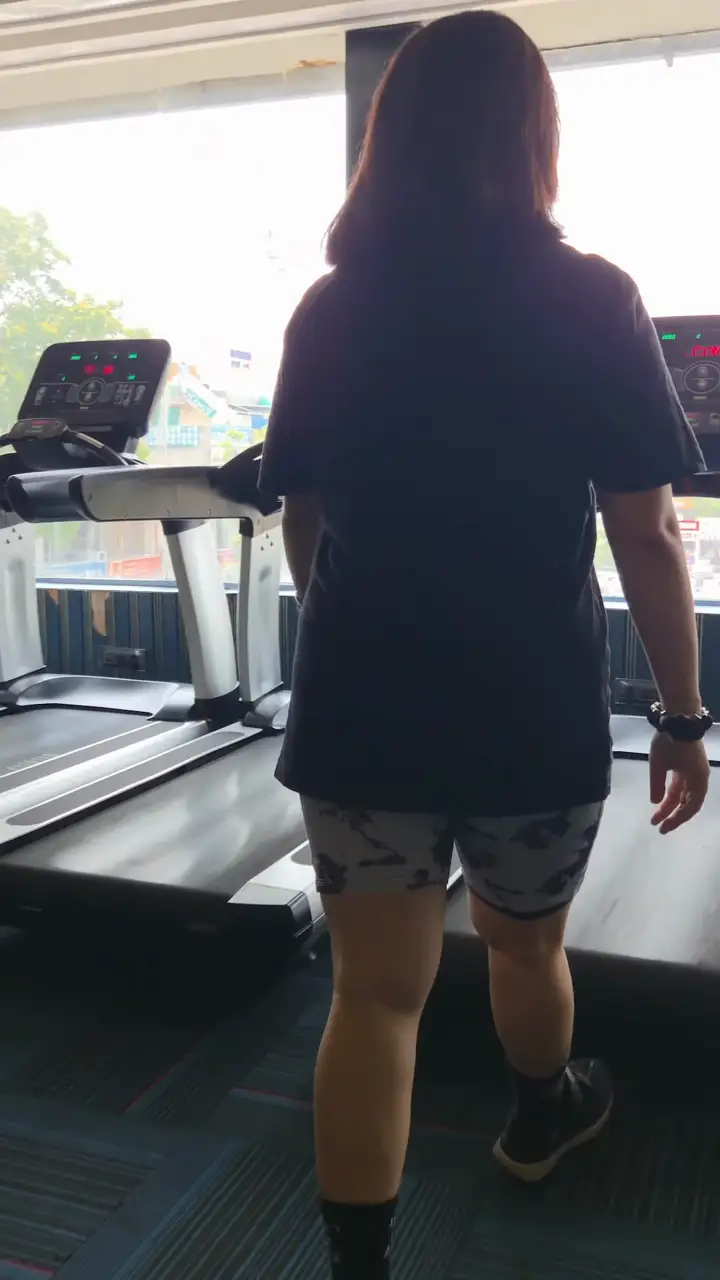 Cardio section with treadmills by the window